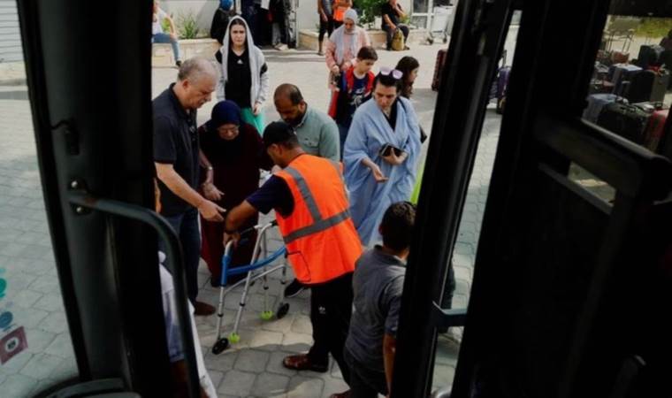 Gaza evacuees crossing into Egypt fear for those left behind