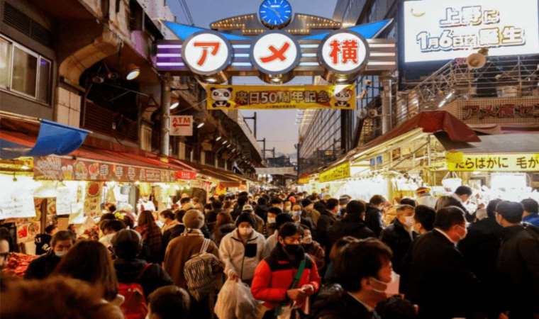 Japan's population falls while foreign residents rise to record