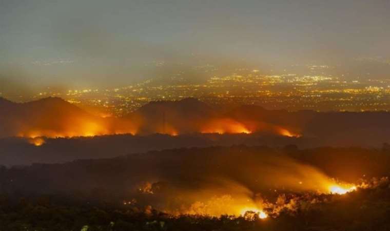 More than 1,000 wildfires continue to rage across Canada