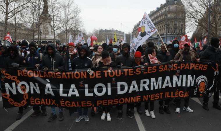 Massive protest in Paris against France's controversial immigration law