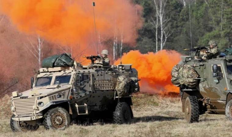 Kremlin warns of NATO conflict over troops in Ukraine