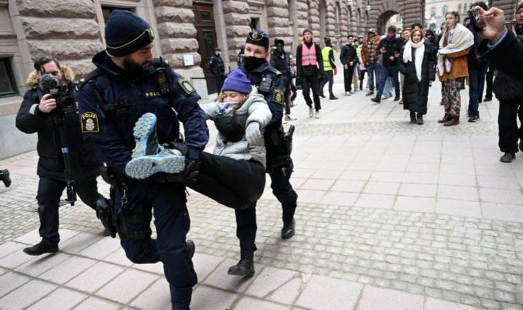 Greta Thunberg and activists removed by police from Swedish Parliament entrance