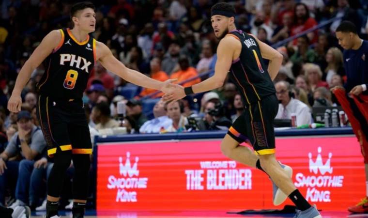 Booker’s 52 powers Suns past Pelicans