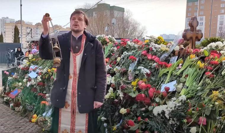 Russian Orthodox Church suspends priest who prayed at Navalny's grave