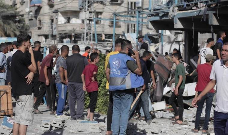 UN refugee agency says 6 staffers killed in Israeli strikes on Gaza school