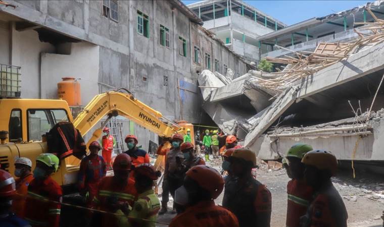 At least 91 students feared trapped after school building collapsed in Indonesia