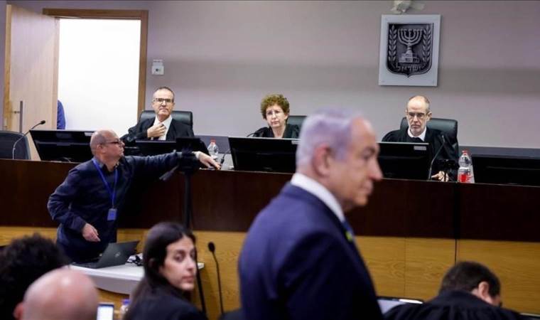 Israeli prime minister returns to court for corruption trial after month-long hiatus