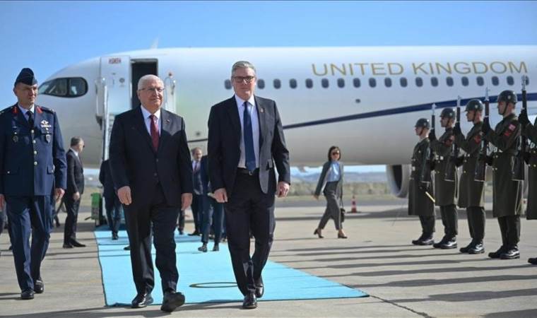 Turkish defense minister welcomes British premier in Ank Turkish defense minister welcomes British premier in Ank