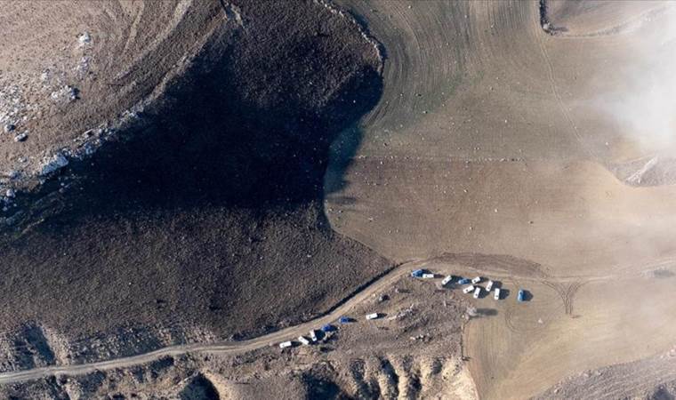 Libyan military delegation examining wreckage of crashed