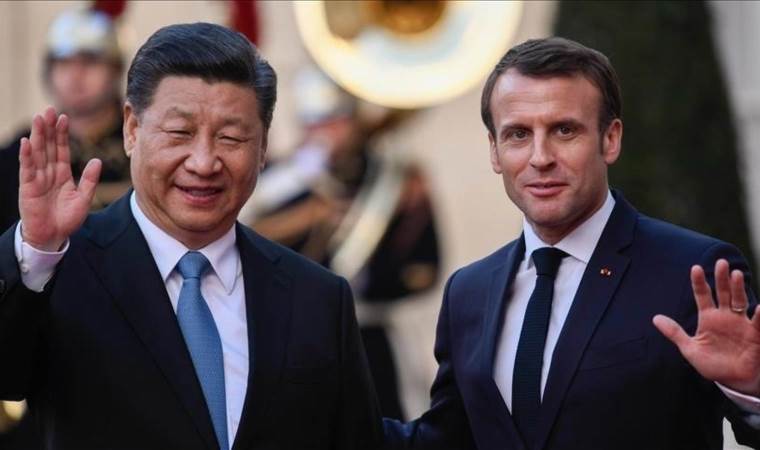 France's Macron calls on China to join efforts for Russi