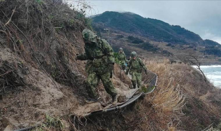 Sweltering temperatures, tsunami threats batter parts of Japan