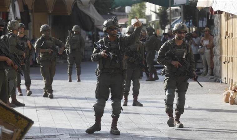 Israel mobilizes 100,000 reservists as it signals broade